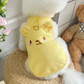 Yellow waffle-textured dog vest on a mannequin, showing casual fit and lightweight fabric.