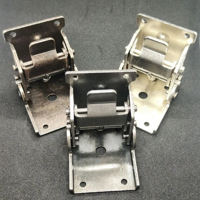 Folding furniture hinge with self-locking mechanism in multiple electroplated finishes including black bronze and matte black.