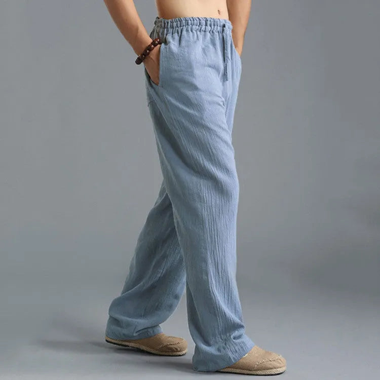 Men's linen loose casual sports pants in khaki, side view, on a hanger