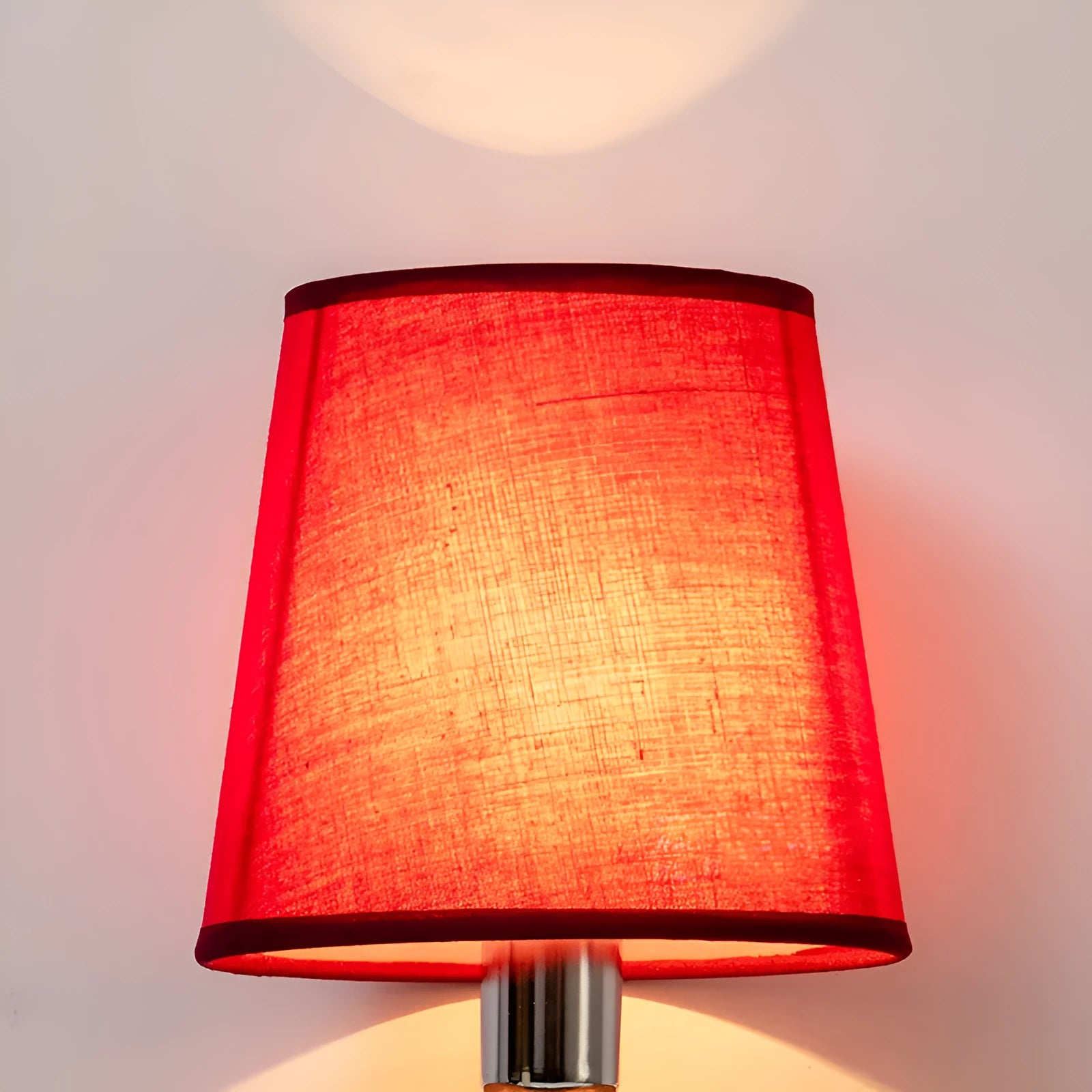 Modern minimalist fabric drum lampshade in a mini size on a table lamp base.