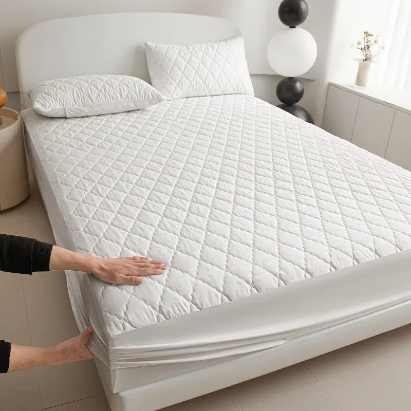 Diamond lattice quilted waterproof mattress protector fitted sheet in bamboo fibre.