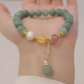 Zhen Han style women's bracelet made of Myanmar jade with geometric shapes and bead pearl decoration.
