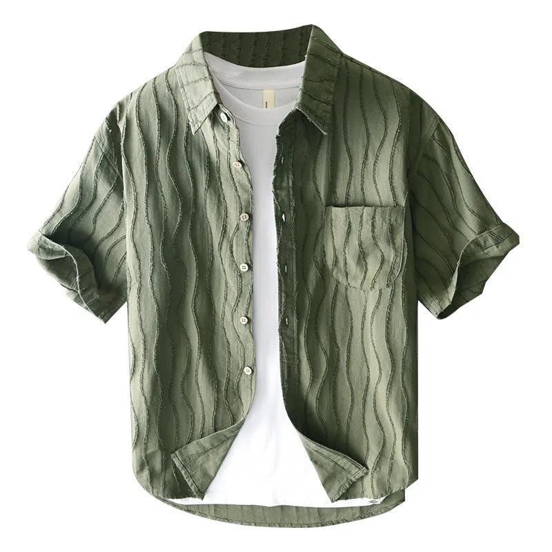 Man wearing a loose-fit apricot pure cotton short sleeve casual shirt with a Japanese fresh style.