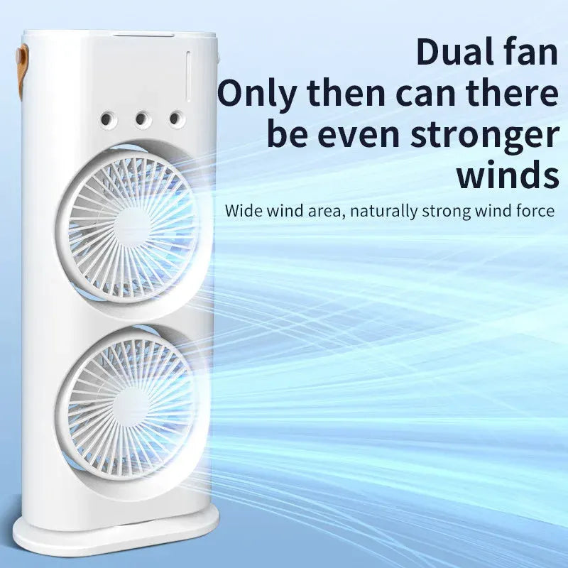 White double-ended portable USB fan with humidifying spray tank and remote control on a desk.