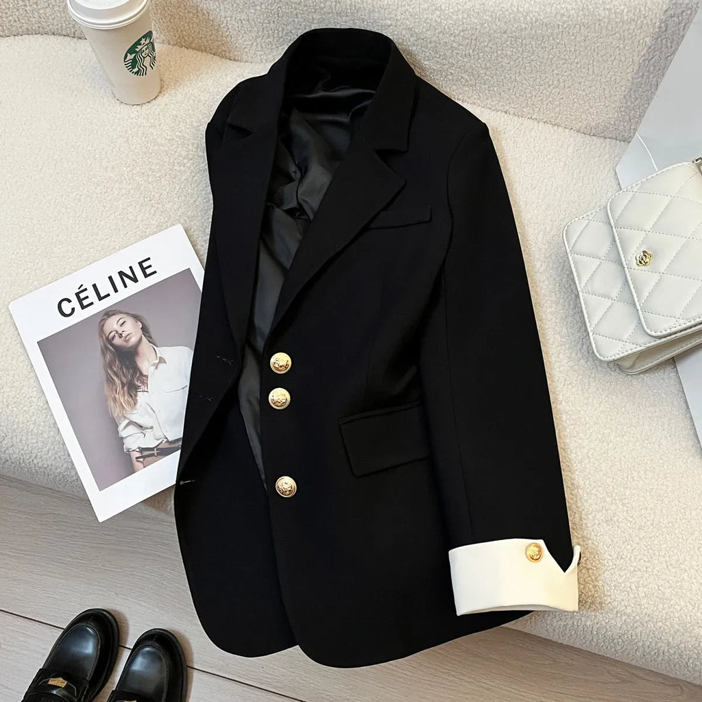 Korean style loose fit women's coat in milky white, shown with long sleeves and pockets.