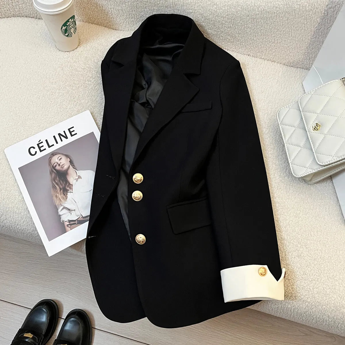 Korean style loose fit women's coat in milky white, shown with long sleeves and pockets.