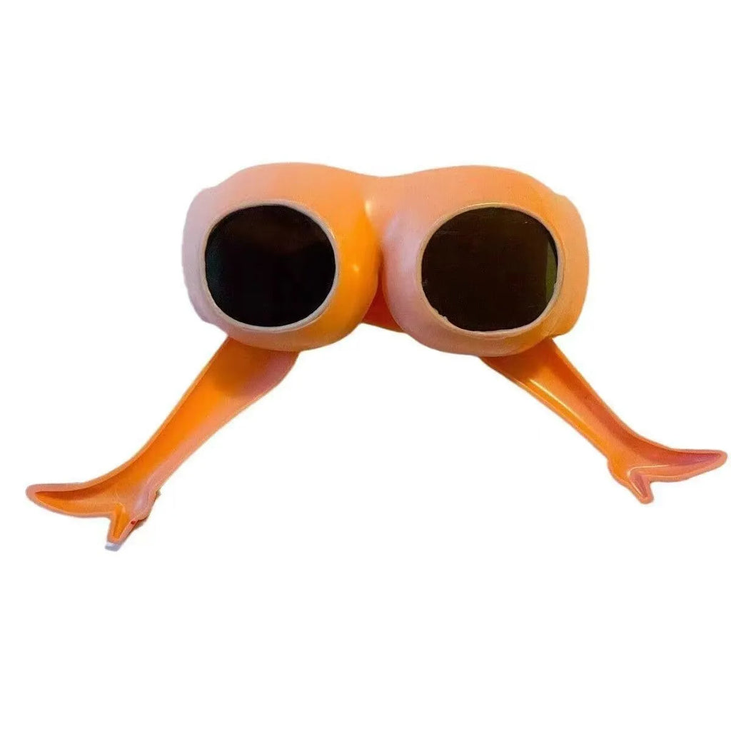 Orange novelty sunglasses with a unique leg hip style design on a white background.