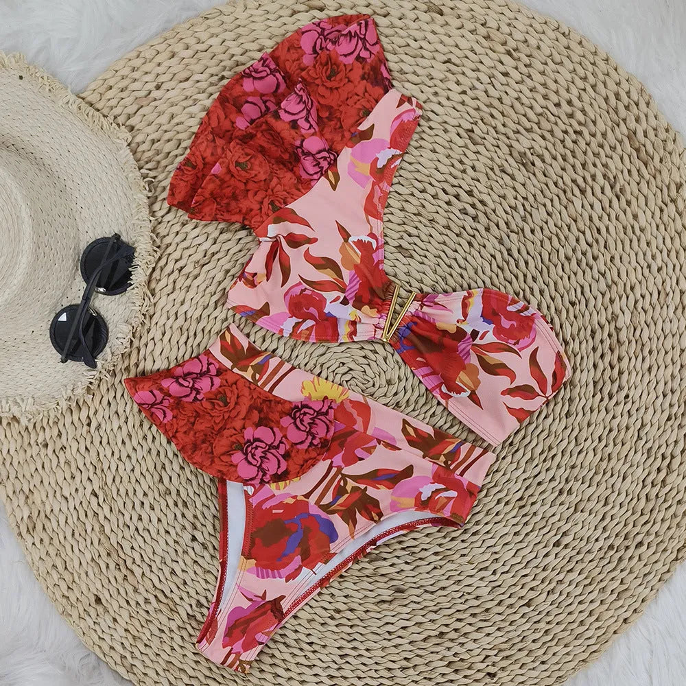Women's pink floral print one-shoulder bikini with ruffled detailing and high-waist briefs
