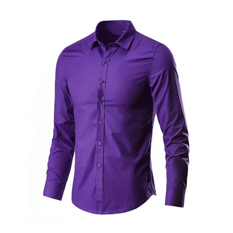 Man's long-sleeve loose-fit linen shirt in a light colour, showing the button front and relaxed silhouette.