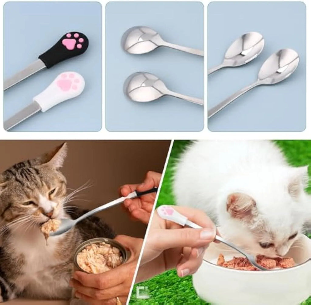 Two pet food spoons with cat paw designs in white and black colours