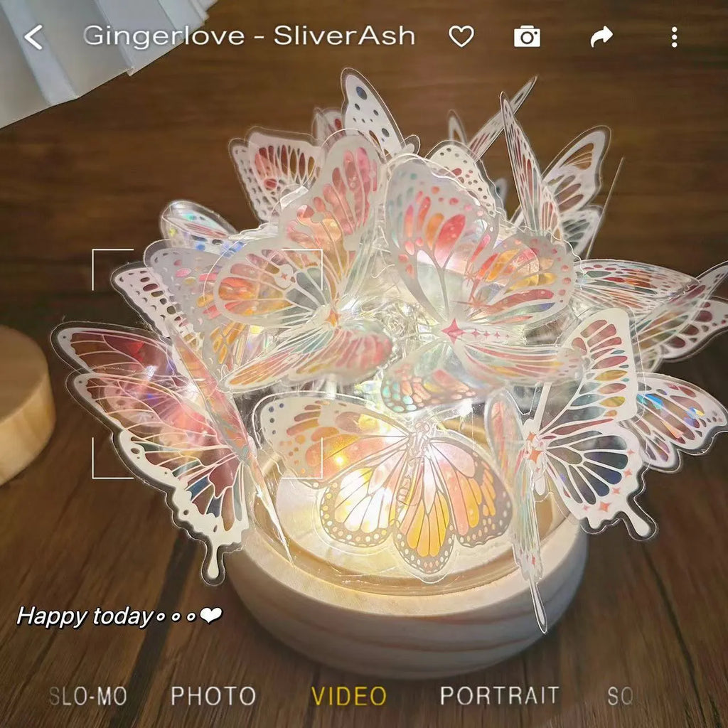 Butterfly night lamp with glass shade on raw wood base for bedside table lighting