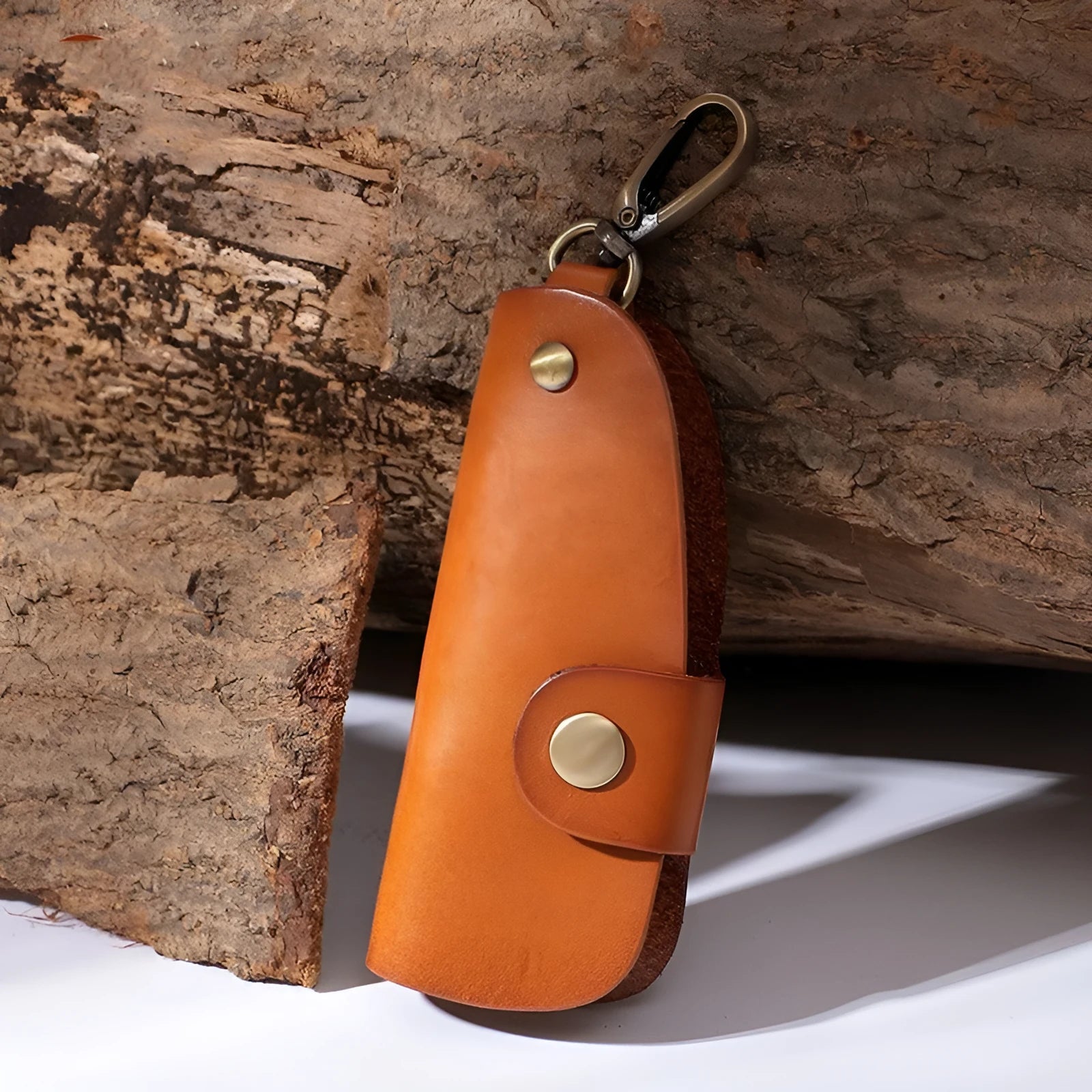 Genuine leather handmade key storage bag for car keys in black, brown, coffee, and purplish red.