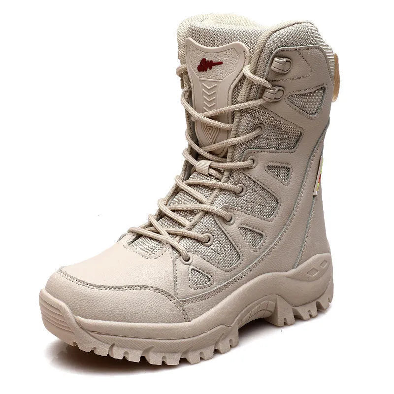 Men's beige cowhide leather hi-top hiking shoes with platform sole on a rocky outdoor surface.