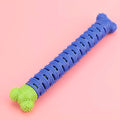Blue dog dental cleaning stick with serrated brush head and gum massage nodules