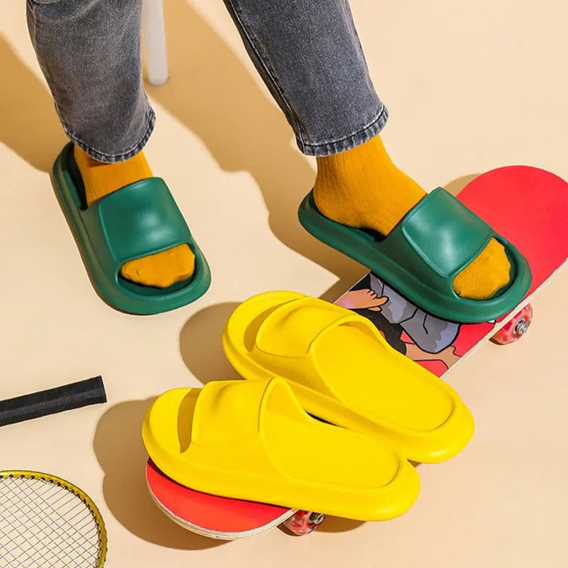 Soft unisex EVA house slippers with a thick non-slip sole in multiple colours.