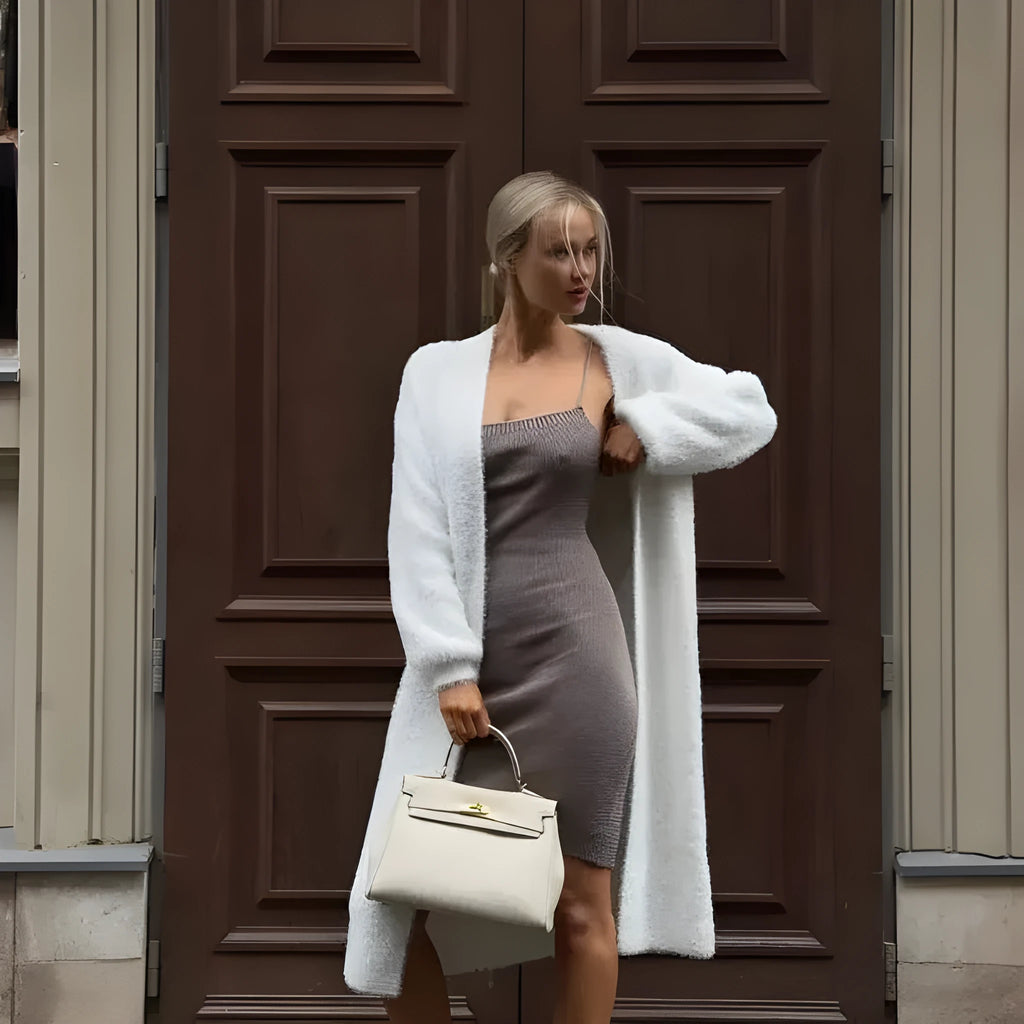 White long sleeve knit cardigan jacket on a hanger