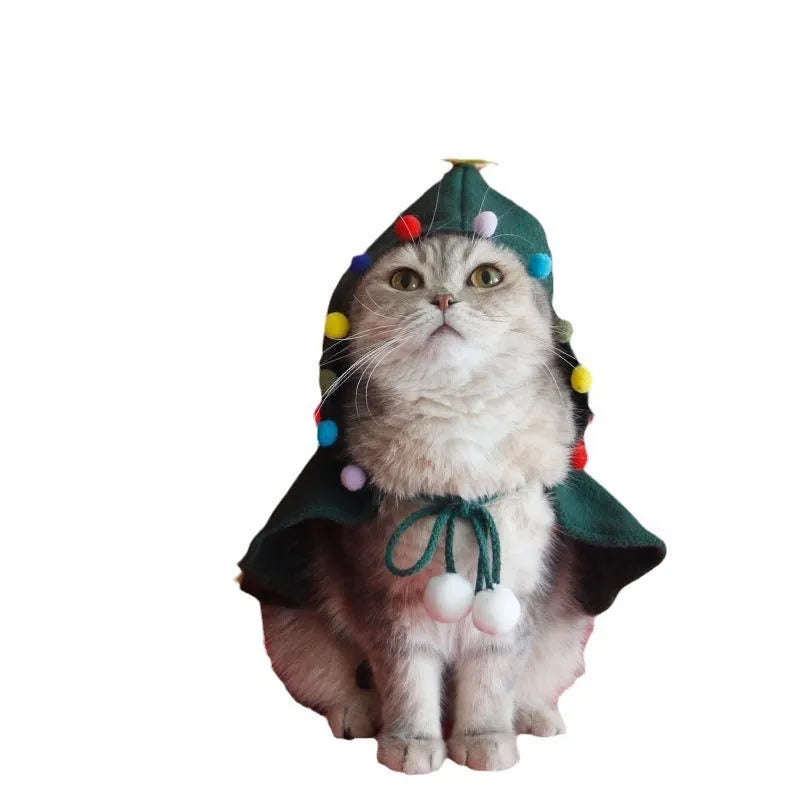 Red polar fleece Christmas cloak with hood and antlers for pets on wooden floor
