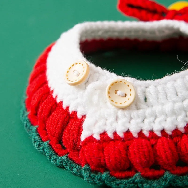 Hand knitted Christmas pet collar for cats made from milk cotton yarn with adjustable sizing and festive bow design
