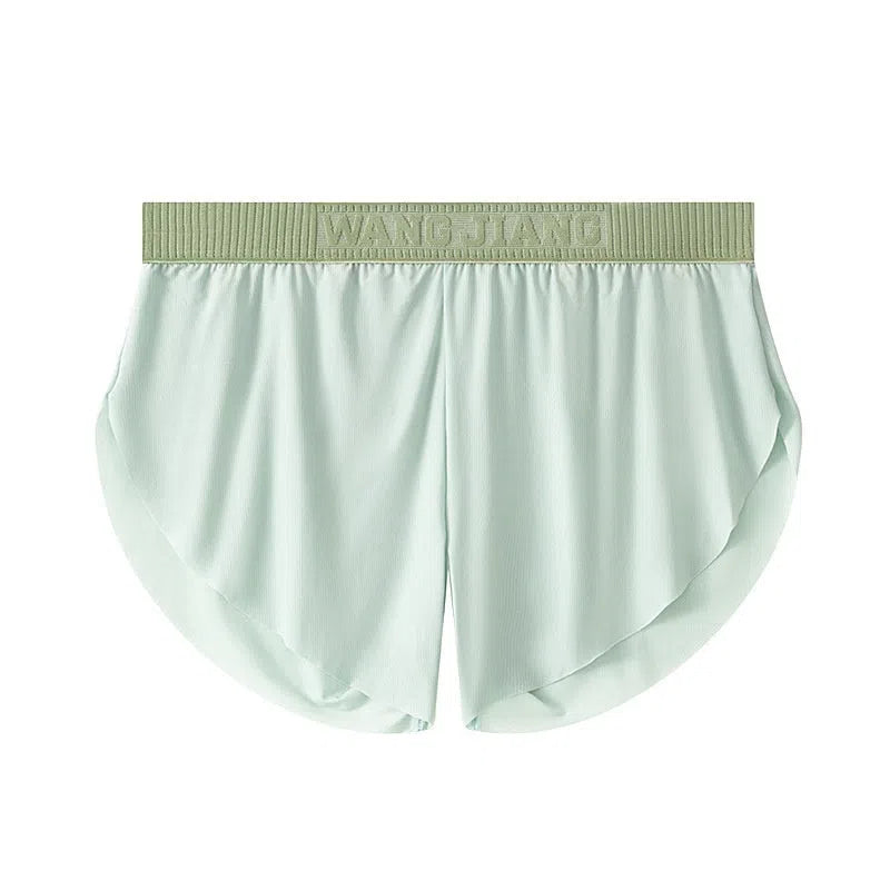 Men's seamless polyester low-waist shorts in light green, loose fit, summer homewear