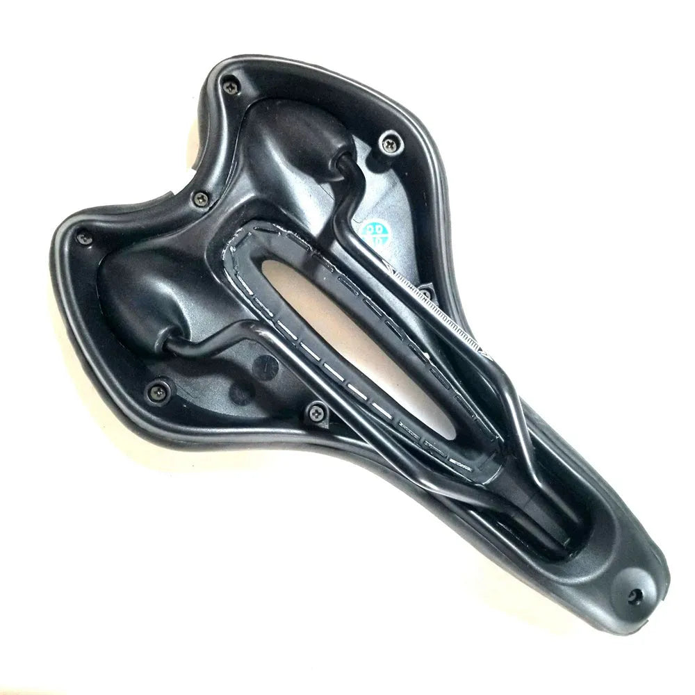 Silicone bicycle cushion saddle with PU leather cover, spring, and included wrench and tyre patches.