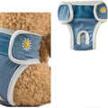 Reusable washable dog physiological pants in blue with cartoon print on a white background