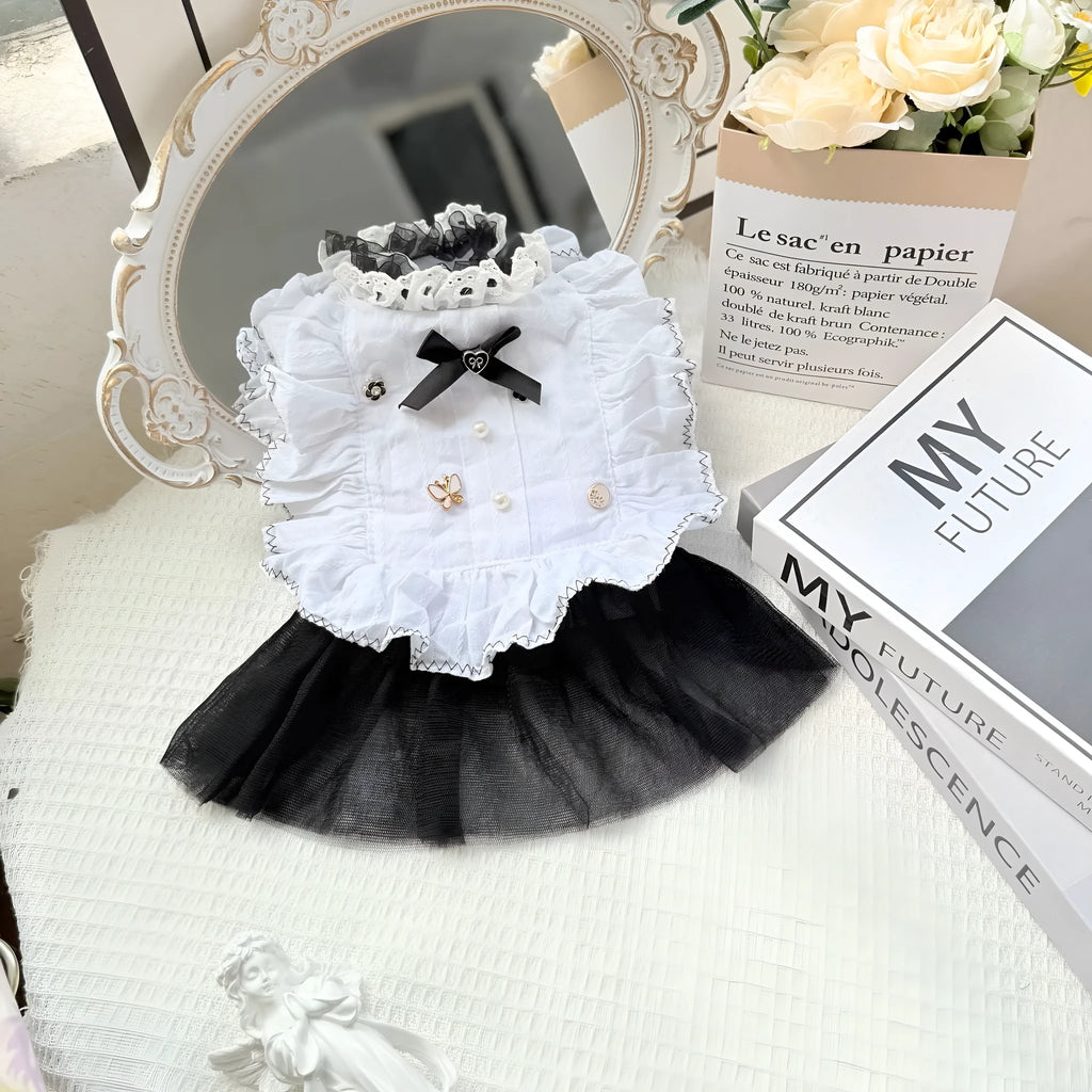 White polyester waltz gauze skirt princess dress for a small dog on a hanger.