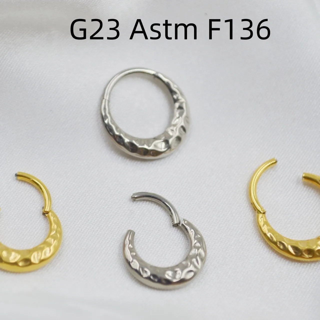 ASTM F136 titanium alloy nose ring with concave-convex carved design in gold and silver colour options