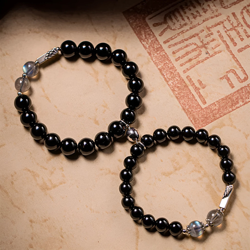 DIY kit with black obsidian Buddha beads, 8mm and 10mm sizes, and cord for a couple's bracelet set.