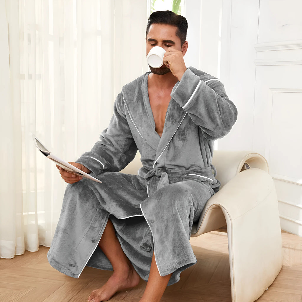 Man in a grey flannel bathrobe, European style, for winter home wear.