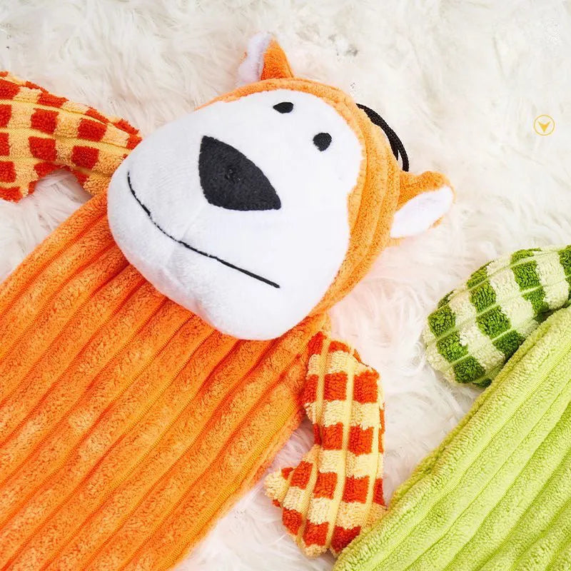 Green and orange 4-inch plush dog toy with squeaker for aggressive chewers