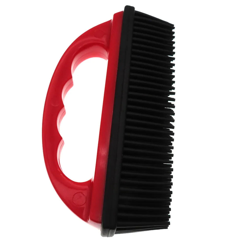 Red silicone pet hair removal brush with oval head measuring 160mm by 85mm.