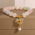Women's morganite crystal bracelet with colourful butterfly pendant in original jewellery design