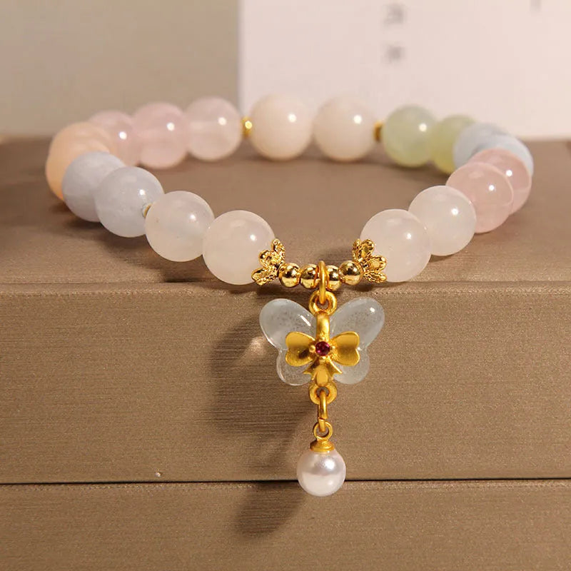Women's morganite crystal bracelet with colourful butterfly pendant in original jewellery design