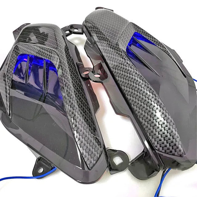 Pair of YAMAHA NMAX LED side lamps in carbon fibre design with blue or red light options