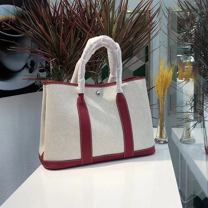 Women's canvas bucket tote bag with genuine leather trim in black, brown, grey or red colour