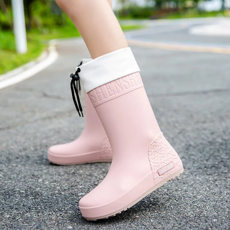 Women's non-slip PVC rain boots in apricot, black, brown, and pink waterproof mouth colours