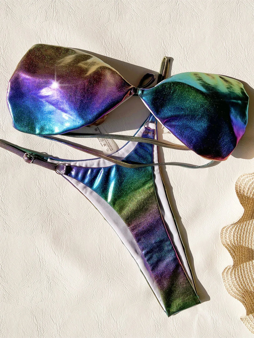 Women's purple gradient bikini swimsuit set made of polyester fabric.