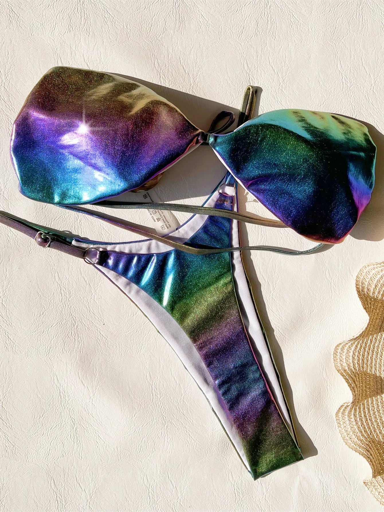 Women's purple gradient bikini swimsuit set made of polyester fabric.