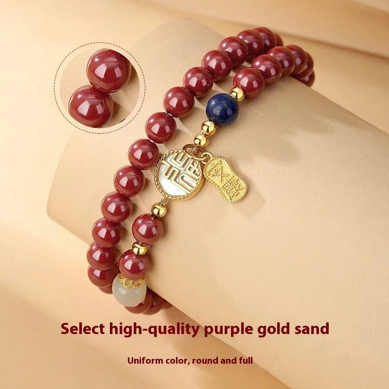 S925 sterling silver bracelet with purple gold sandstone charm, white shell card, and red cinnabar details.