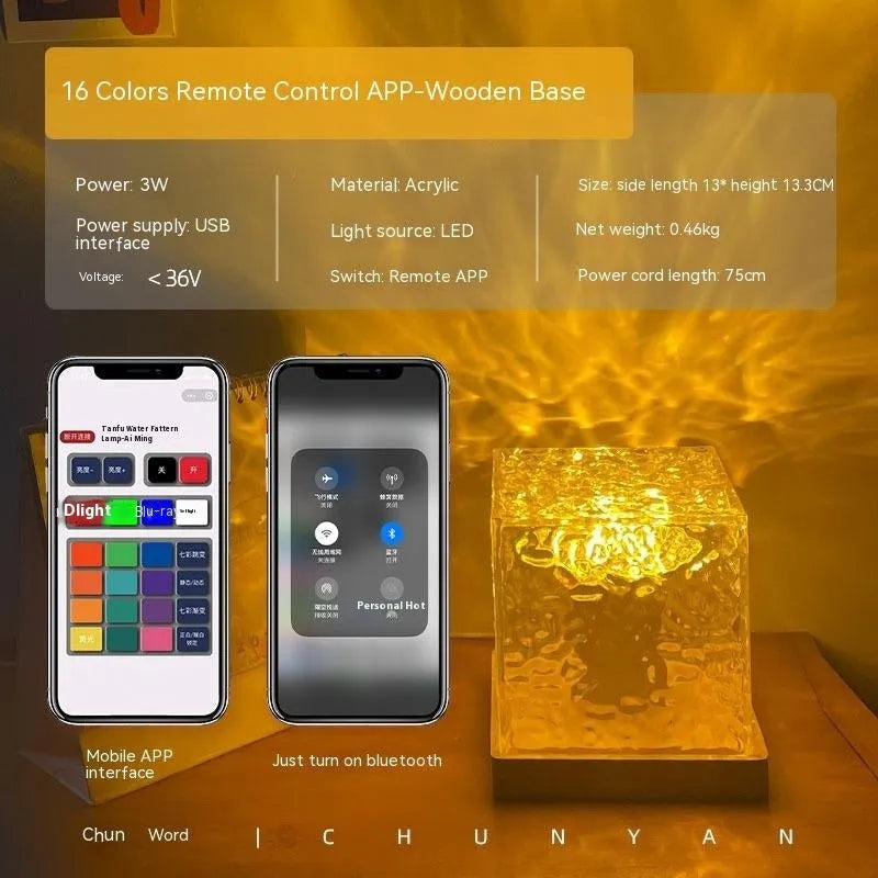 LED water ripple night light with rotating crystal projection and remote control on wooden surface