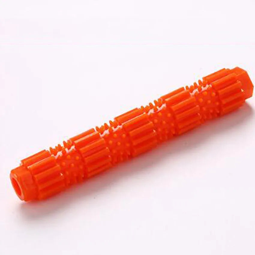 Green and orange rubber dog chew toy with treat dispensing design and textured surface