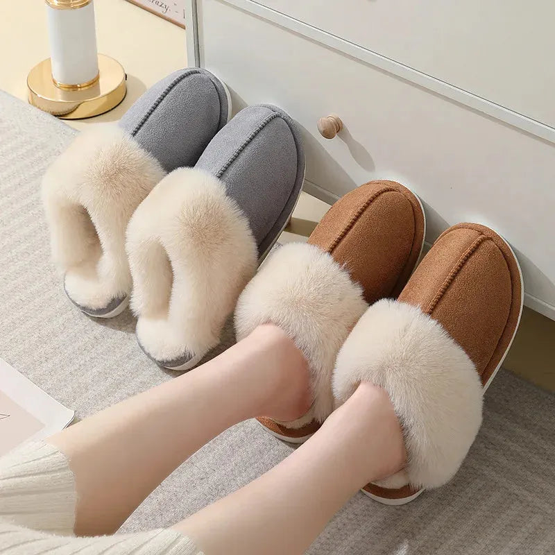 Women's plush winter slippers with artificial wool lining and a PVC sole in multiple colours.