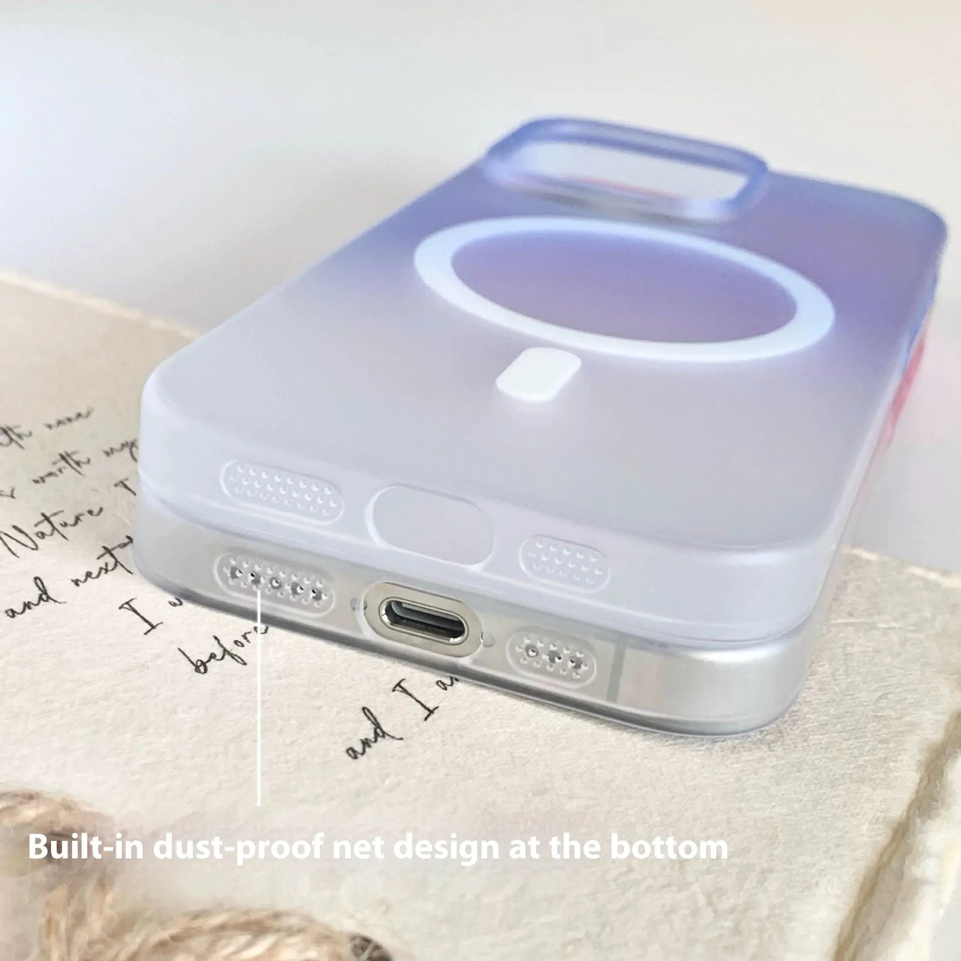 Gradient coloured frosted magnetic suction case for iPhone on a table