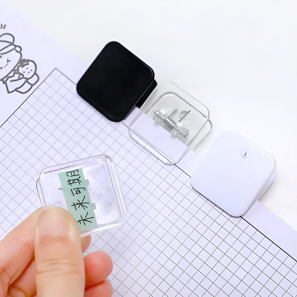 Square plastic photo note holder in black, white, or transparent colours measuring 3.2x3cm