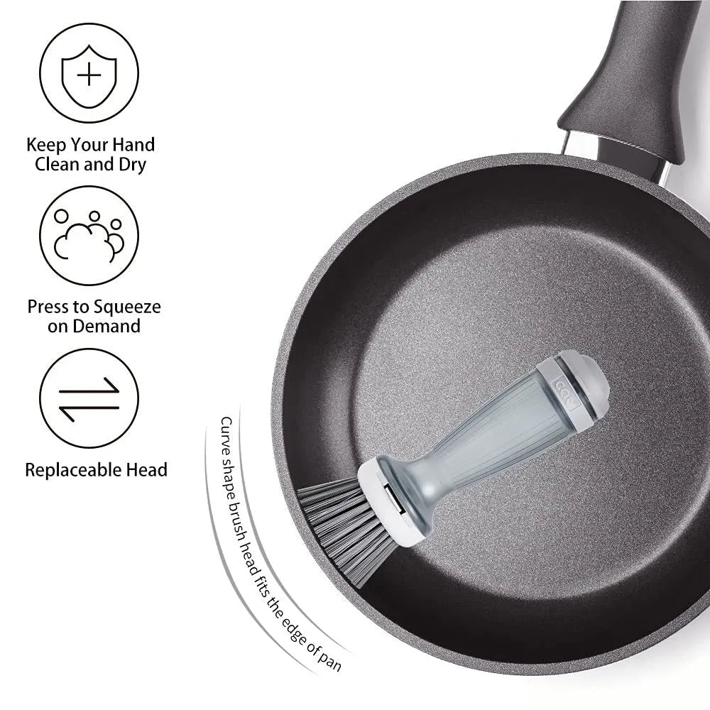 Milk white pot brush with soap dispenser in handle and non-scratch bristles for kitchen sink use.