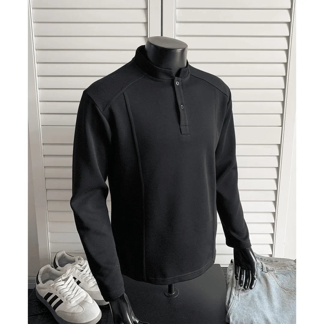 Men's loose-fitting asymmetric patchwork polo shirt with a stand-up collar and long sleeves in grey.