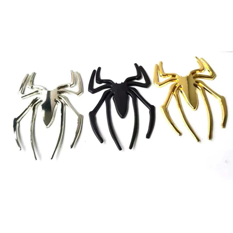 Zinc alloy 3D spider car bumper sticker in gold, silver, black, and red colours.
