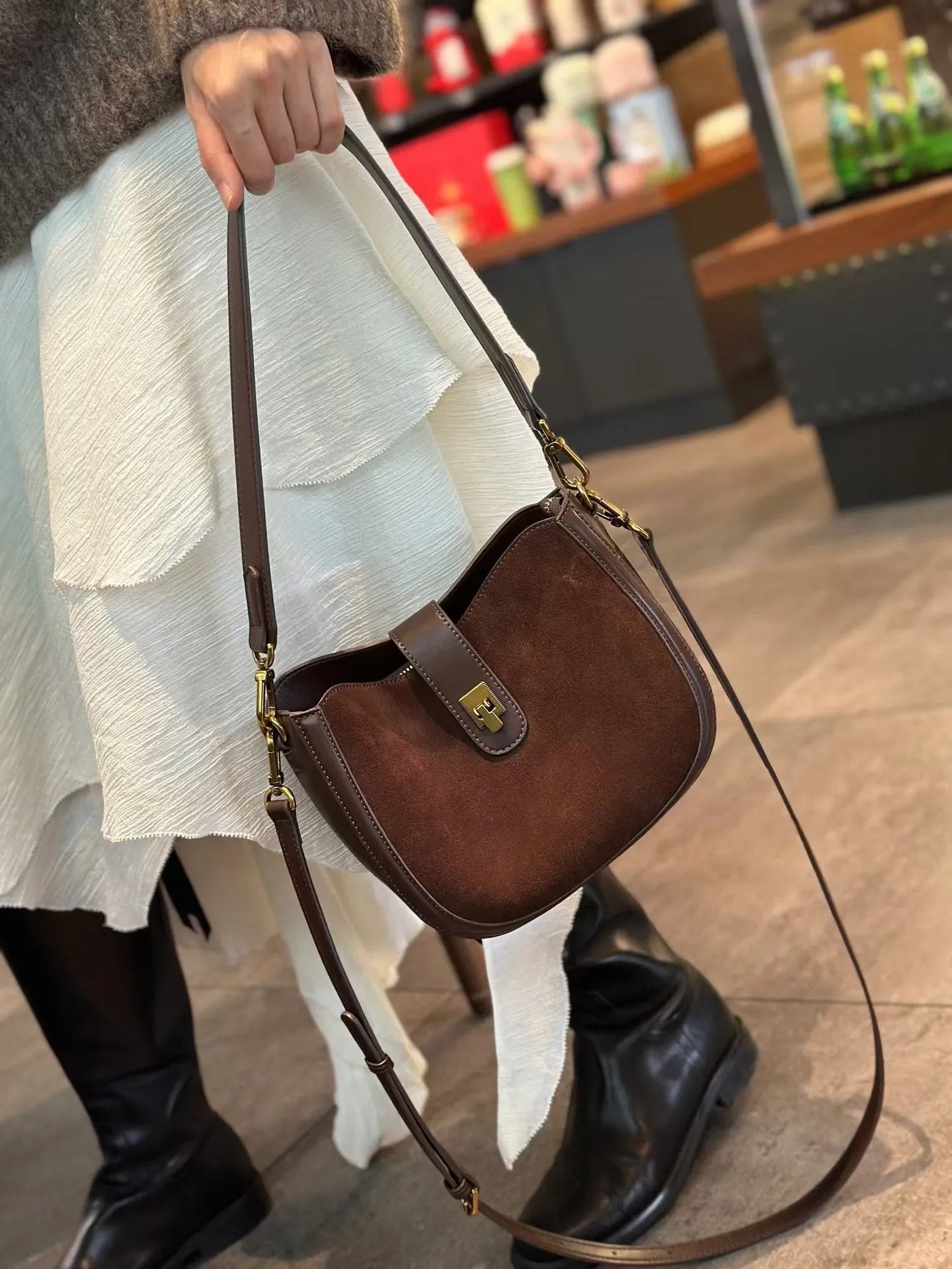 Women's genuine leather crossbody bag in black with sandwich pocket design