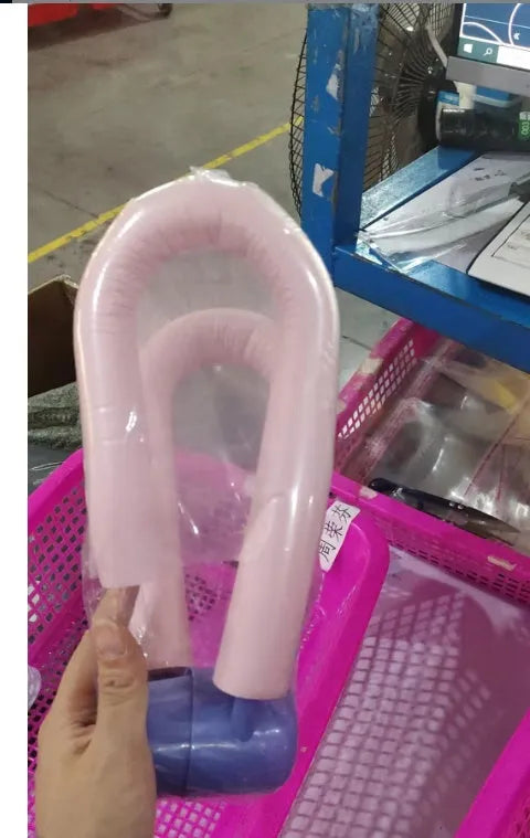 Pink leg training clip made of PVC, foam and steel spring for arm, leg, chest and waist exercise.