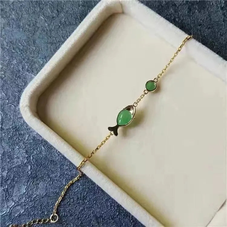 Retro-style yellow gold coloured bracelet made from copper and plastic with a minimalist design.